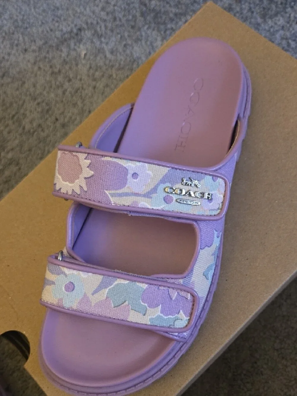 Selling Coach sandals.